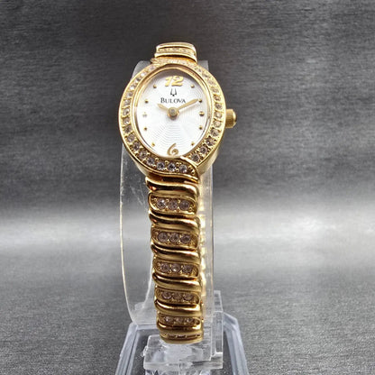 Bulova Watch Women 17mm White Dial Gold Tone Oval Gemmed 97V23 New Battery5