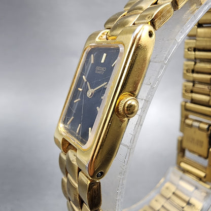 Seiko Tank Watch Women 14mm Black Dial Gold Tone Rectangle 1F205D20 New Battery2