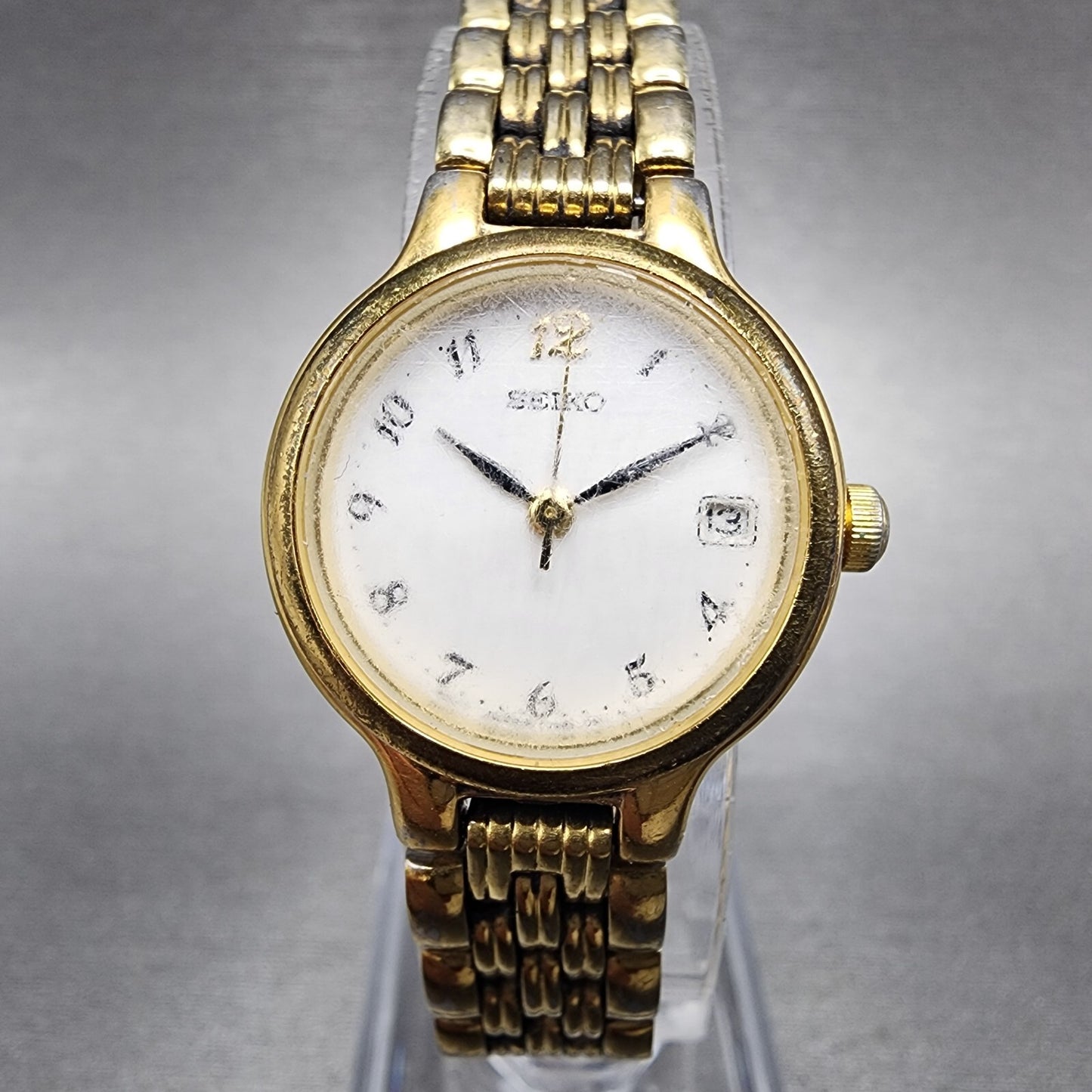 Seiko Watch Women 23mm White Dial Gold Tone Date Round 7N820228 New Battery0