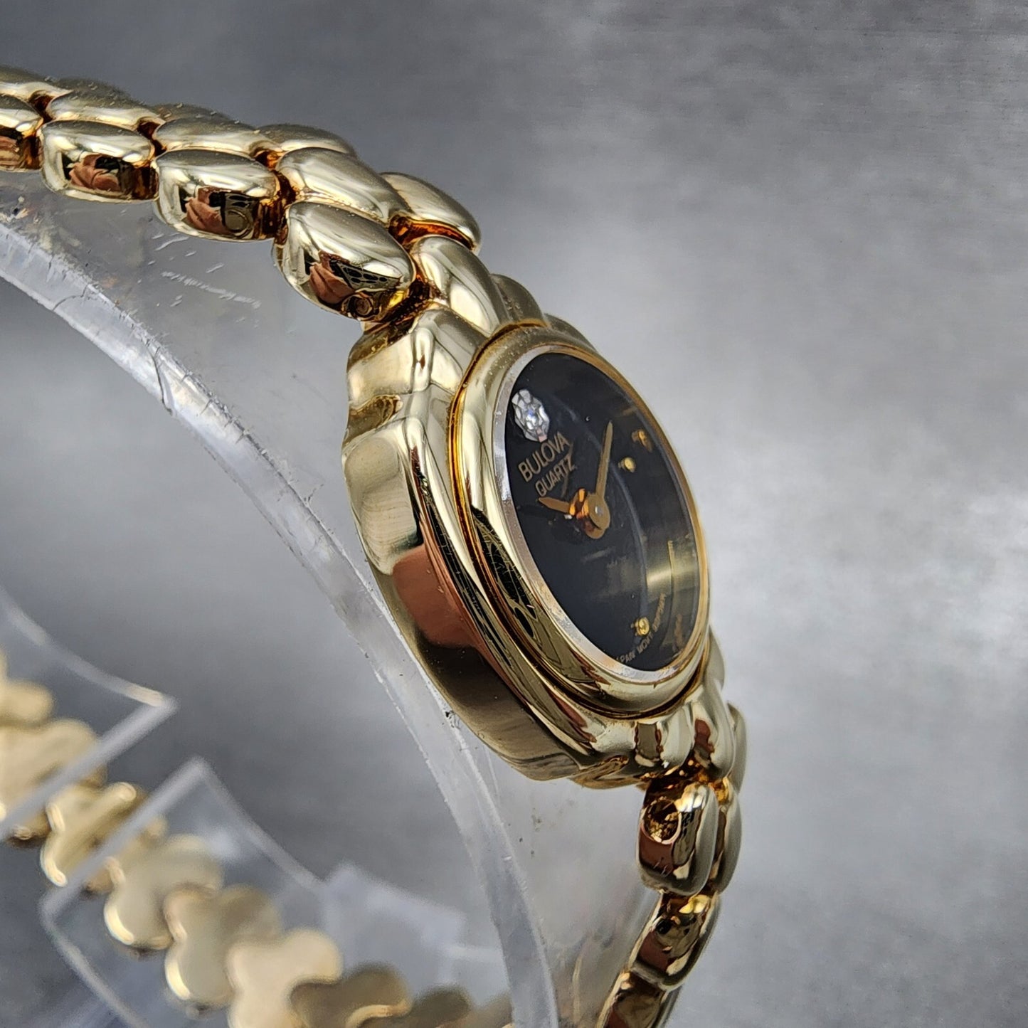 Bulova Watch Women 17mm Black Dial Gold Tone Round 92F59 New Batt NOS5