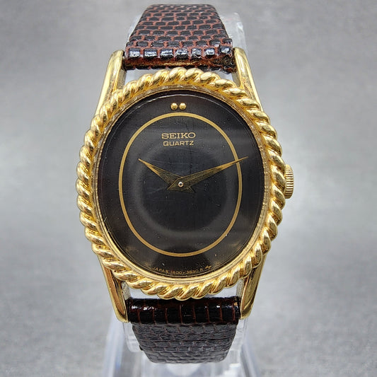 Seiko Watch Women 20mm Black Dial Gold Oval 14007170 New Battery0