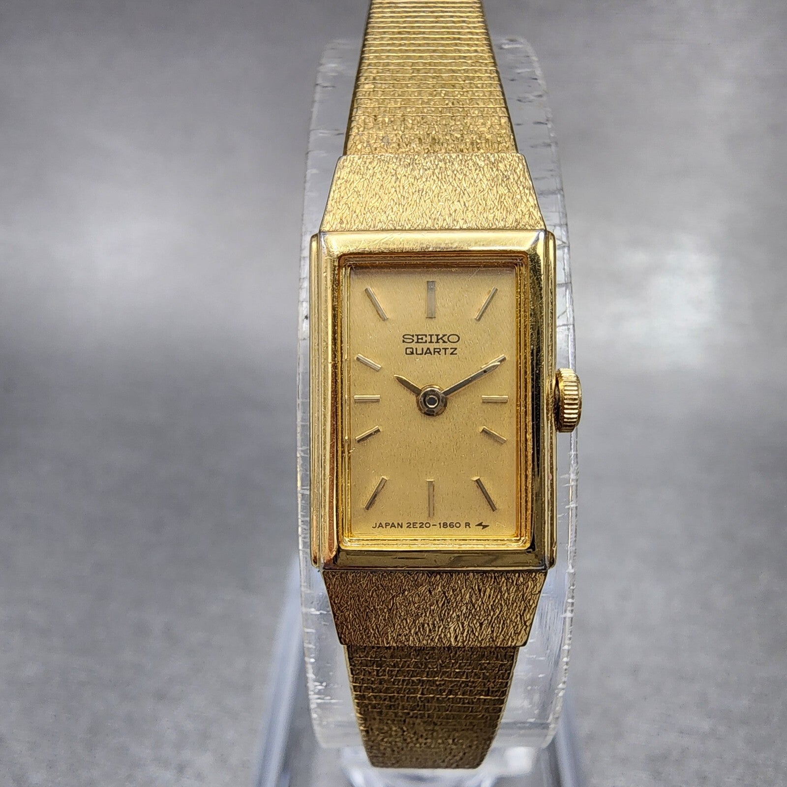 Seiko Tank Watch Women 12mm Gold Dial Gold Tone Rectangle 2E206479 New Battery0