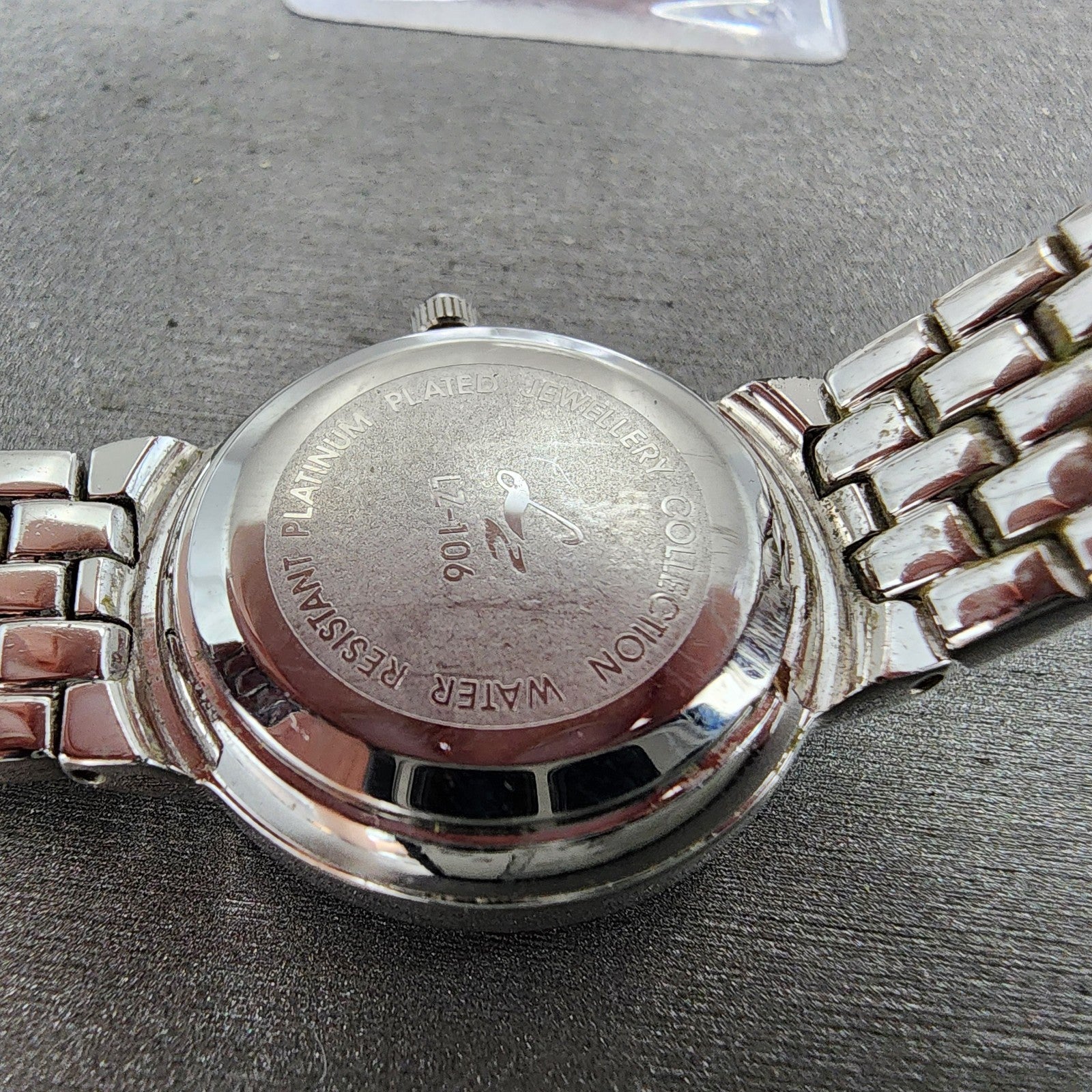 LZ Watch Women 25mm White Dial Silver Tone Ruby Bezel Diamonds Fine Plat New Bat9