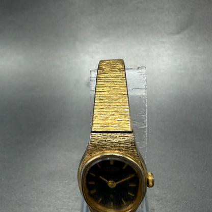 Citizen CQ Watch Women 16mm Black Dial Gold Tone Oval 3220-S16598 New Battery H74