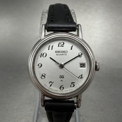 Seiko SQ Watch Women 23mm Silver Dial Silver Tone Date 8522-0030 New Battery0