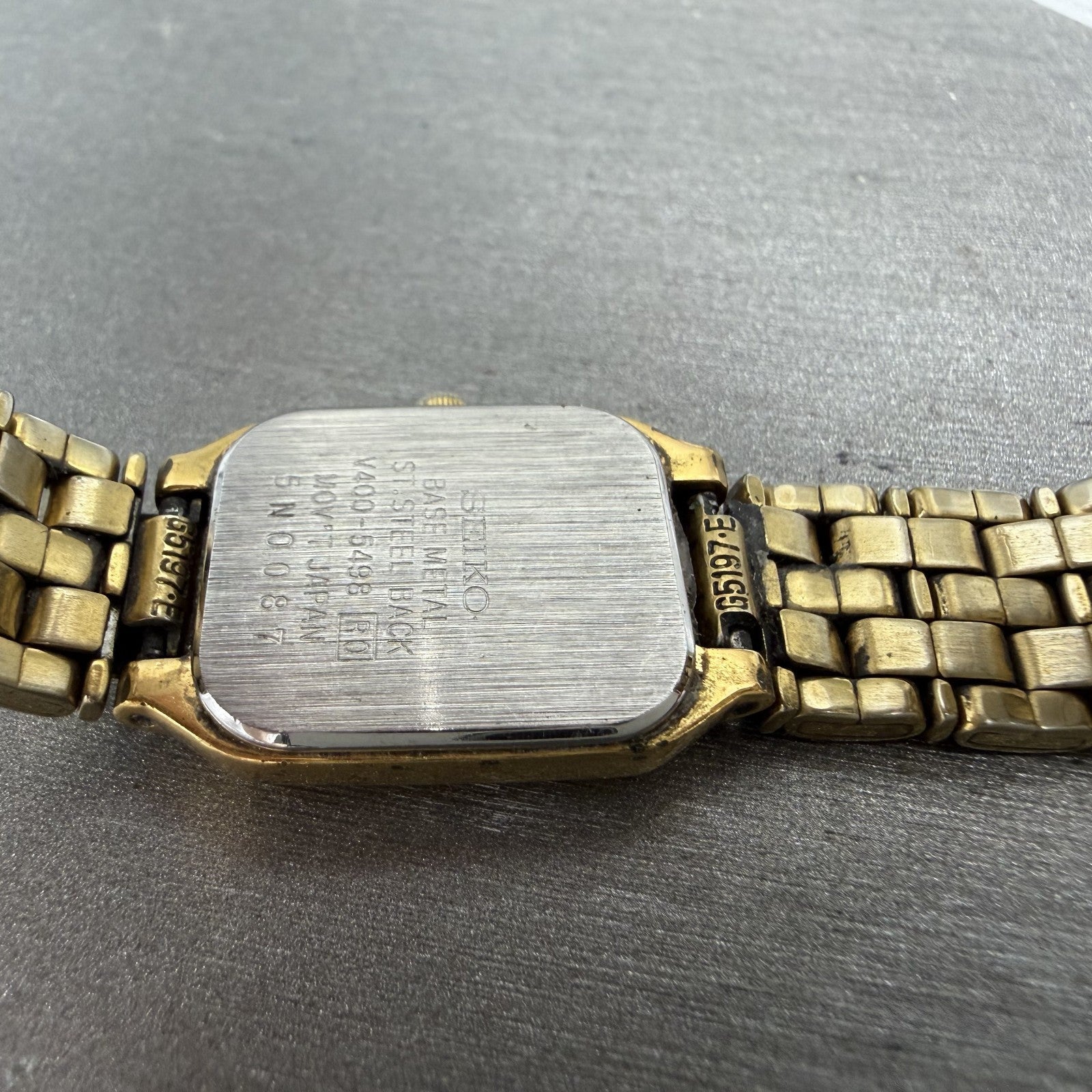 Seiko Tank Watch Women 17mm Black Dial Gold Tone Rectangle V400-5498 New Batt HJ9