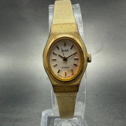 Seiko Alba Watch Women 16mm Silver Dial Gold Tone Oval V233-6150 New Battery0