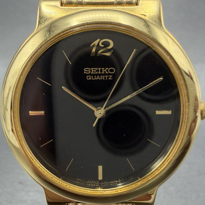 Seiko Watch Men 33mm Black Dial Gold Tone Round Vintage V7011T79 New Battery1