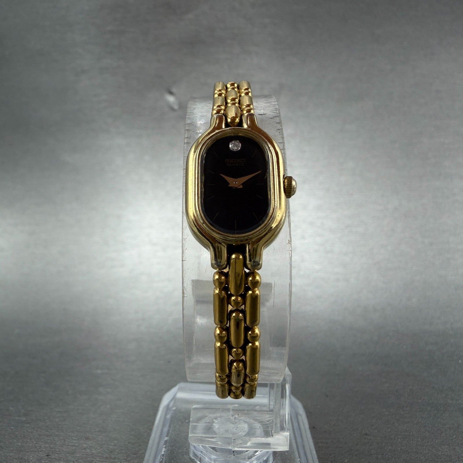 Seiko Watch Women 13mm Black Dial Gold Tone Oval 1e20-6039 New Battery Vinatge5