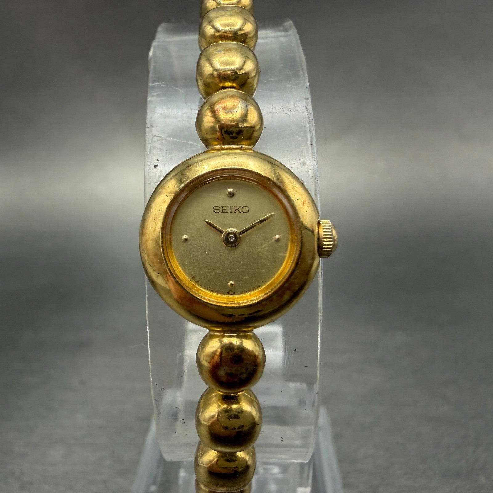 Seiko Watch Women 14mm Champagne Dial Gold Tone Round 1E20-0070 New Battery0