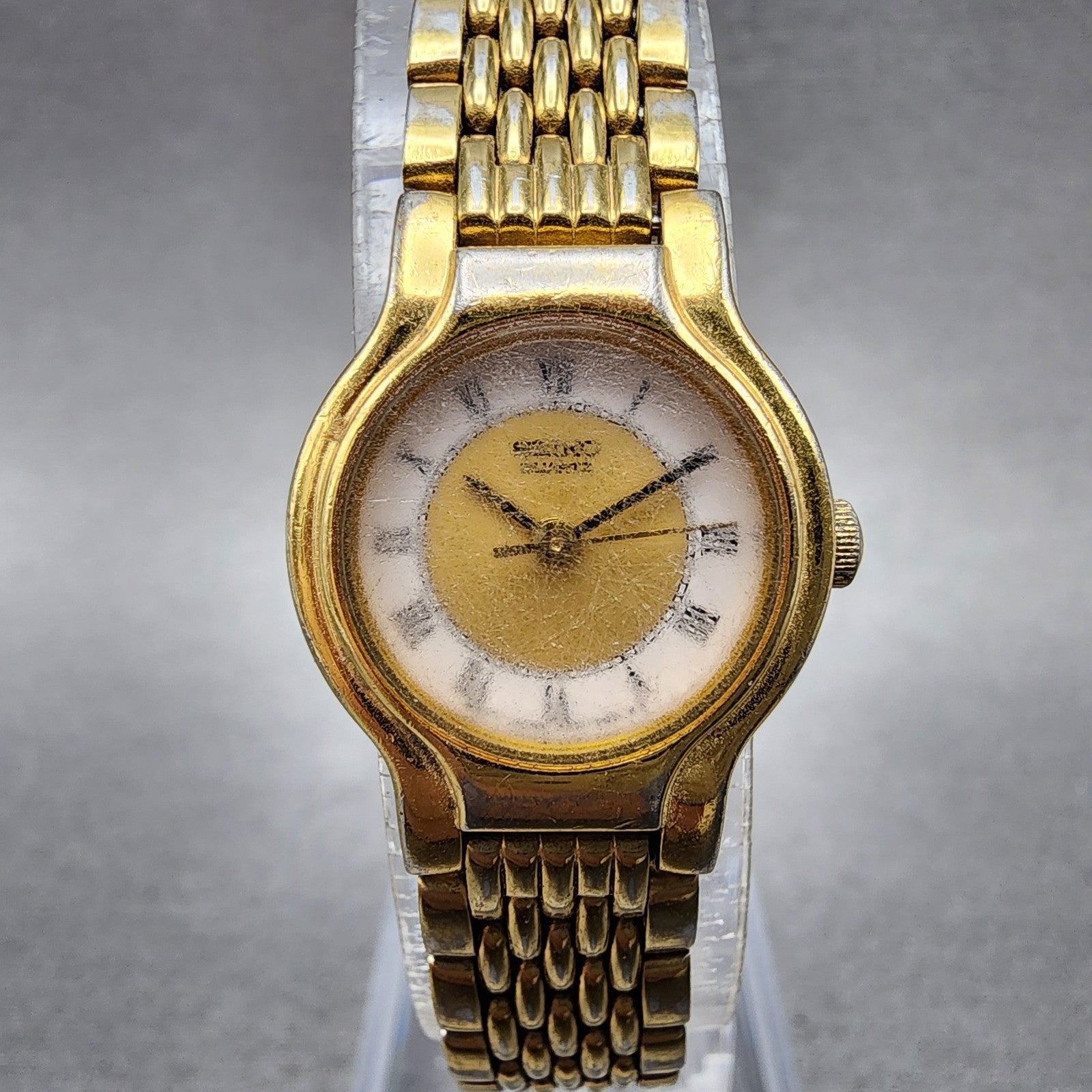 Seiko Watch Women 19mm White Dial Gold Tone Round V4010289 New Battery0