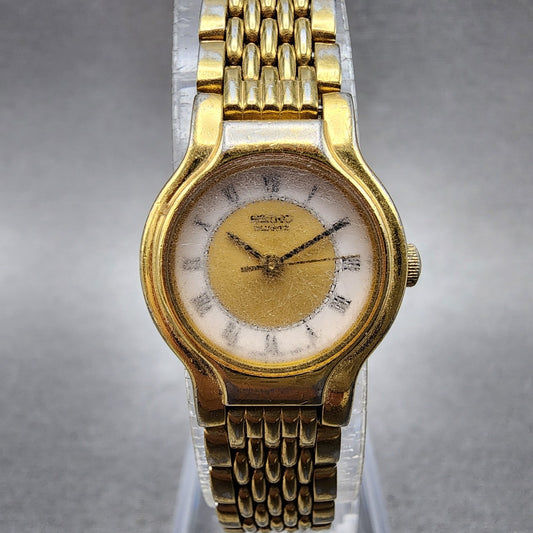 Seiko Watch Women 19mm White Dial Gold Tone Round V4010289 New Battery0