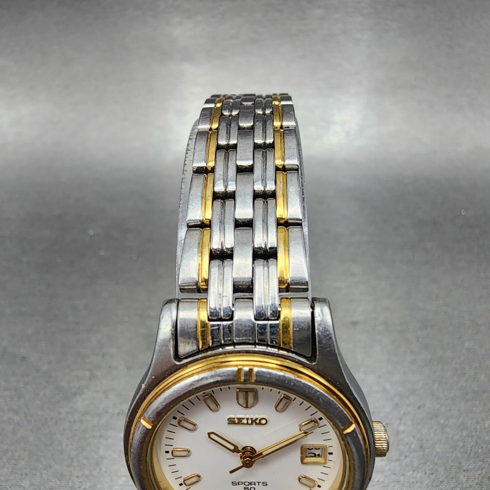 Seiko Sports 50 Watch Women 26mm White Dial Two Tone Date Round 7N820539 Works4