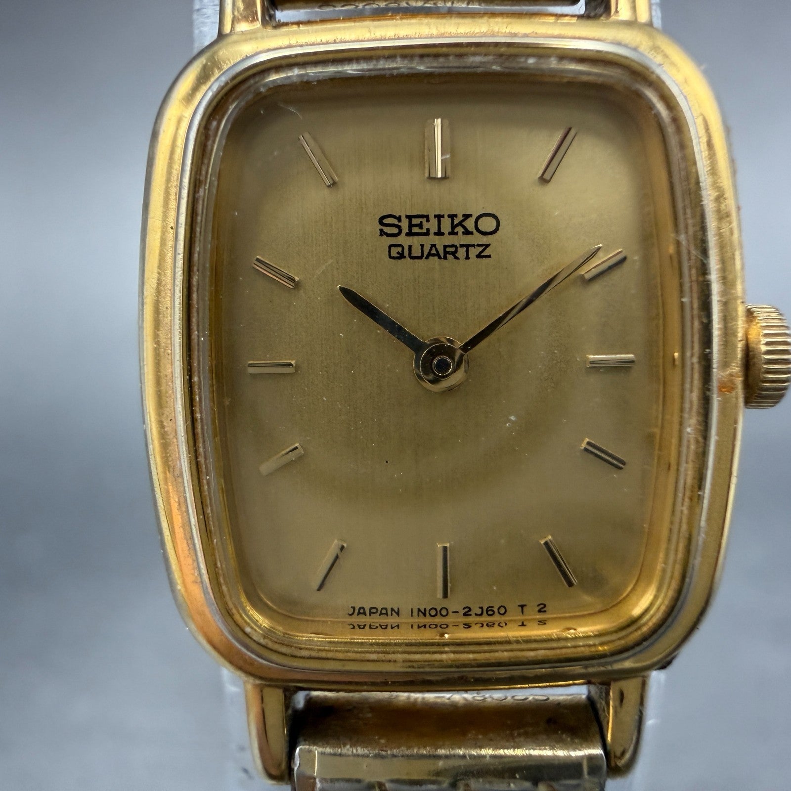 Seiko Watch Women 18mm Champagne Dial Gold Tone Rectangle 1N00-5K29 New Battery51