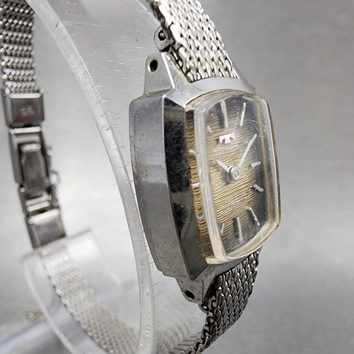 Technos Tank Watch Women 16mm Gold Dial Silver Tone Rectangle Manual Wind Runs3