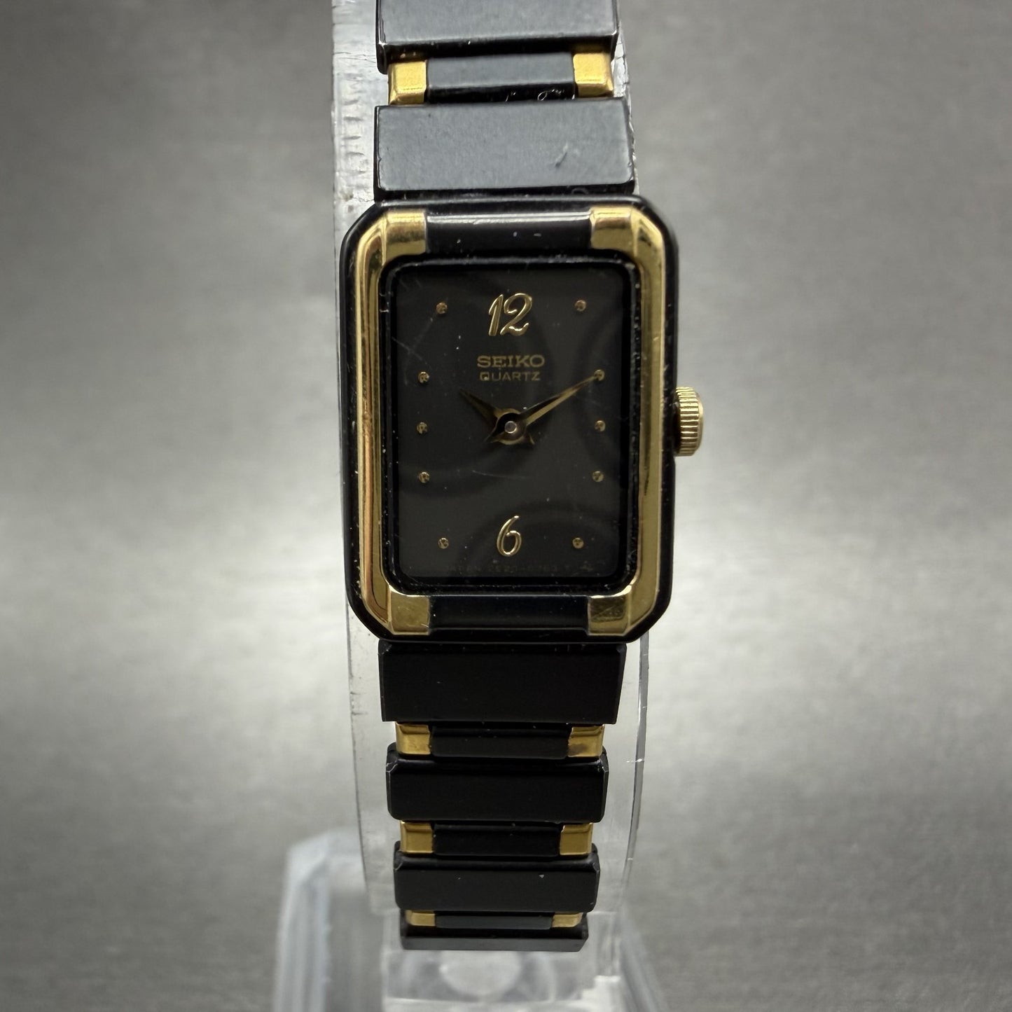 Seiko Tank Watch Women 14mm Black Dial Black & Gold Tone 2E20-5590 New Battery0