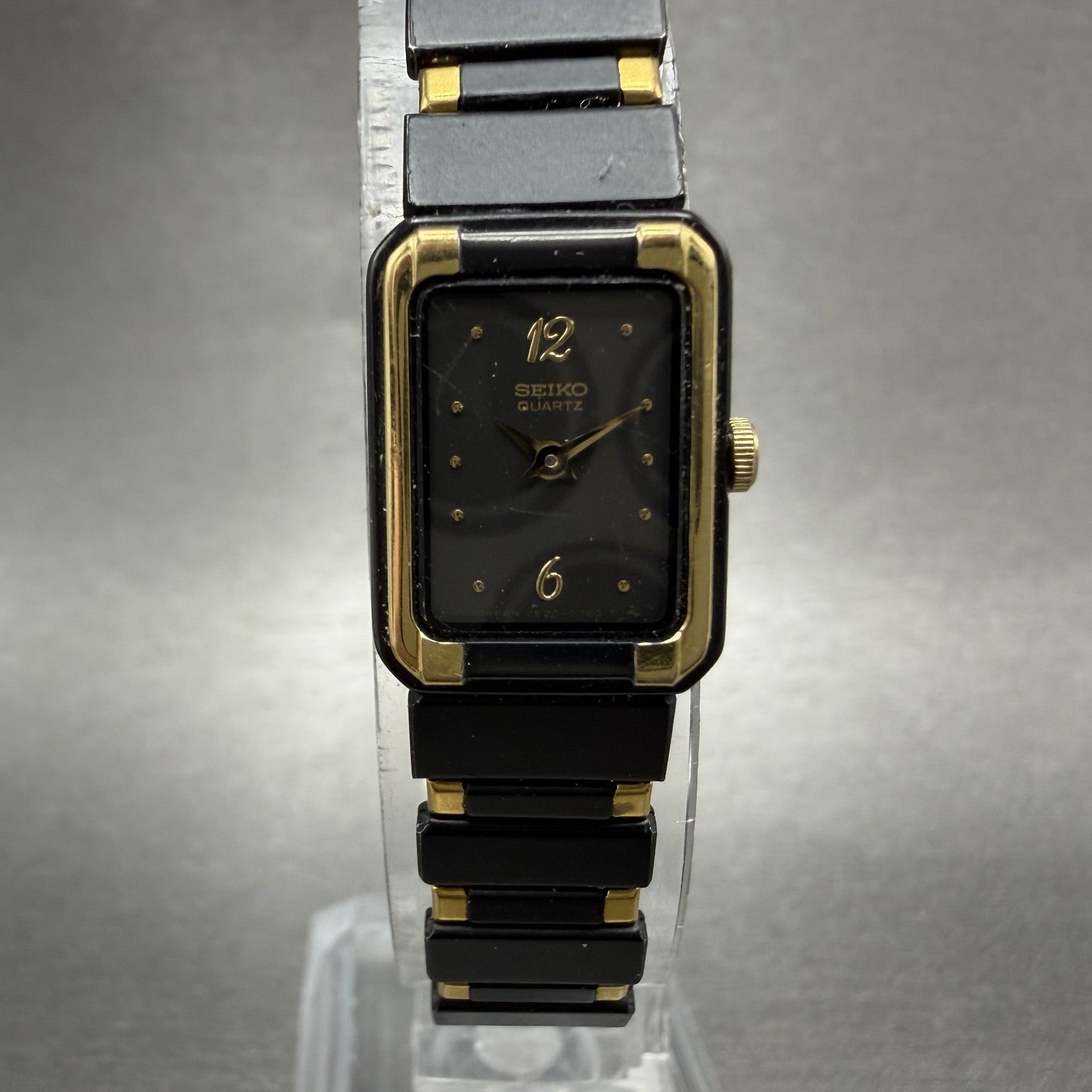 Seiko Tank Watch Women 14mm Black Dial Black & Gold Tone 2E20-5590 New Battery0