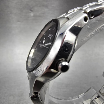 Citizen Eco-Drive Watch Women 26mm Black Dial Silver Tone Date E011-S058503 Runs2