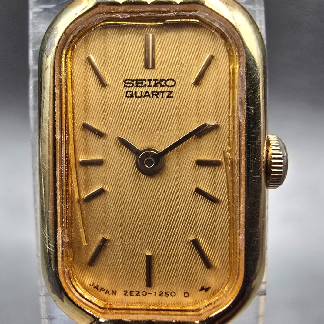 Seiko Tank Watch Women 12mm Gold Dial Gold Tone Rectangle 2E20-6019 New BatteryJ1