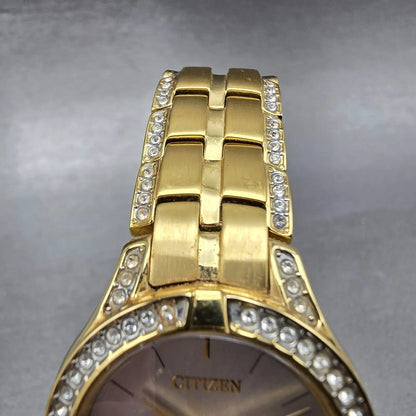 Citizen Eco-Drive Watch Women 28mm Silver Dial Gold Tone Round FE2062-58A Runs4