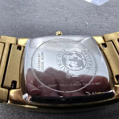 Citizen Eco-Drive Tank Watch Men 31mm Black Dial Gold Date E111-S049369 Runs DG9