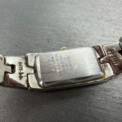 Seiko Watch Women 12mm White Dial Two Tone Rectangle 2E20-7479 New Battery JHK129