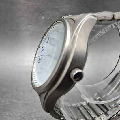Seiko Alba Solar Watch Men 34mm White Dial Titanium Date V145-0AM0 Runs2