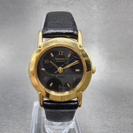 VTG Seiko Watch Women 22mm Black Dial Gold Tone Round 1N010A19 New Battery0