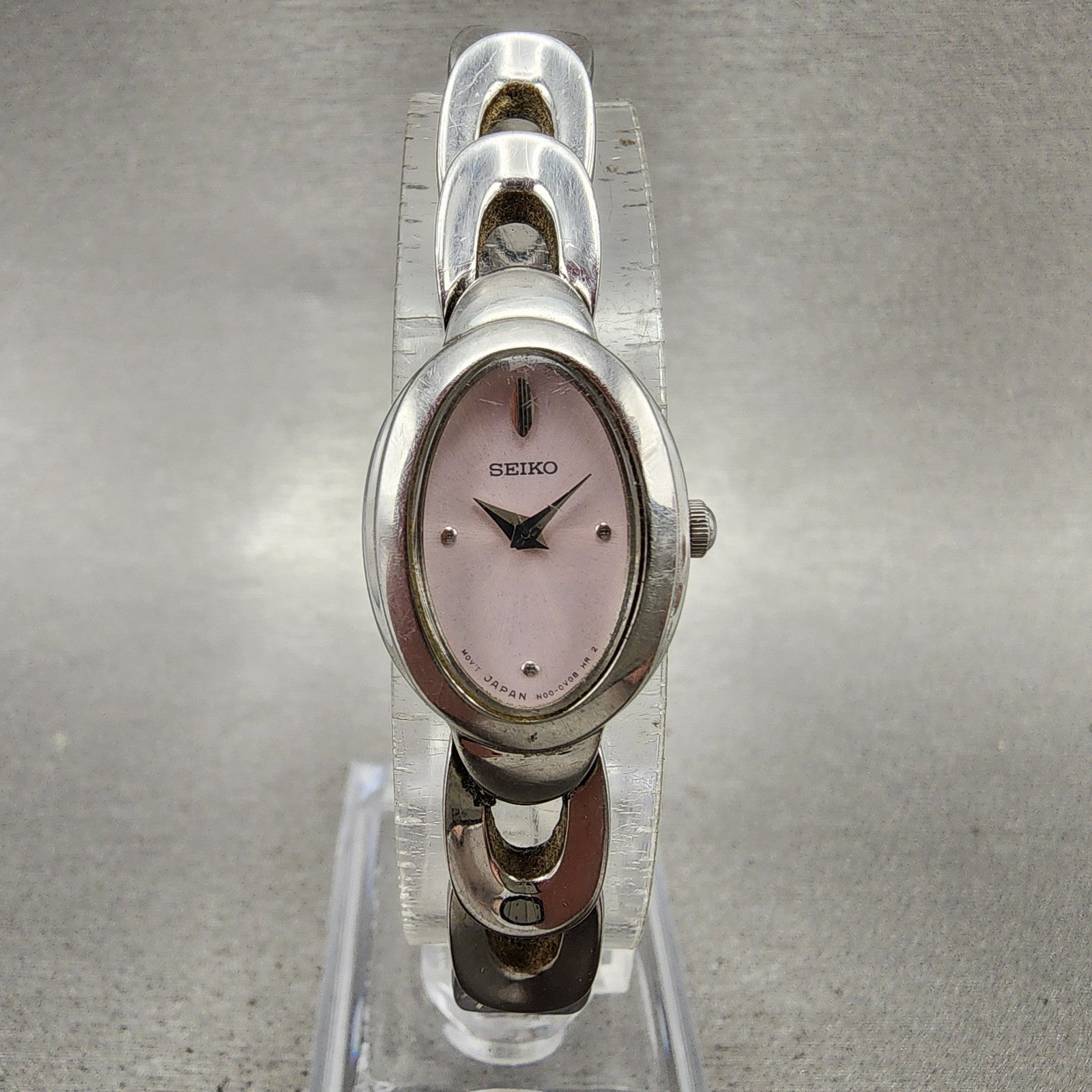 Seiko Watch Women 16mm Pink Dial Silver Tone Oval 1N000MG0 New Battery0
