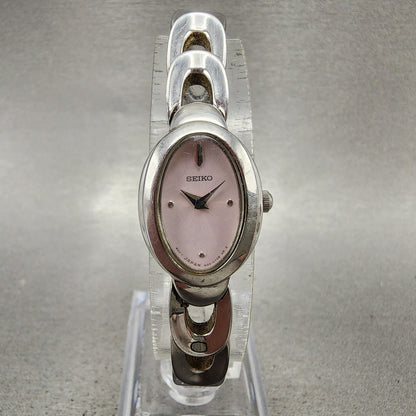 Seiko Watch Women 16mm Pink Dial Silver Tone Oval 1N000MG0 New Battery0