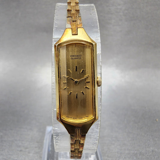 Seiko Watch Women 12mm Champagne Dial Gold Tone Rectangle 2E205179 New Battery0