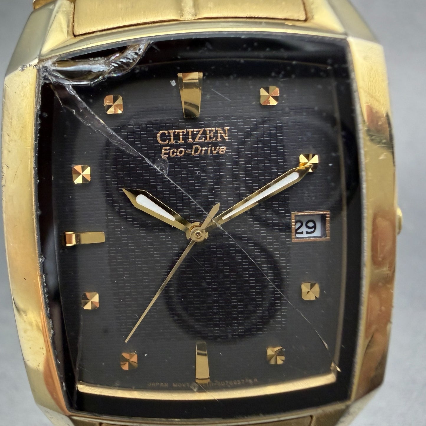 Citizen Eco-Drive Tank Watch Men 31mm Black Dial Gold Tone Date E111-S049369 Run1