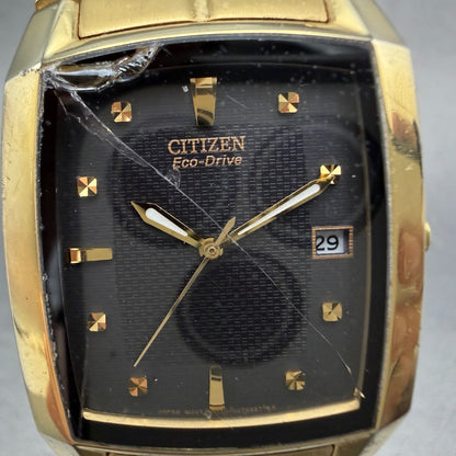 Citizen Eco-Drive Tank Watch Men 31mm Black Dial Gold Tone Date E111-S049369 Run1