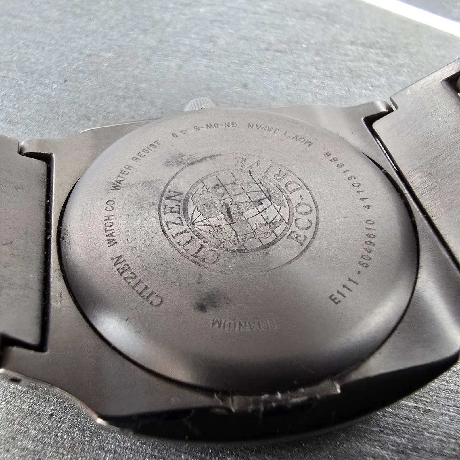 Citizen Eco-Drive Watch Men 38mm Black Dial Titanium Date E111-S049610 Runs EWR7