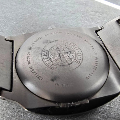 Citizen Eco-Drive Watch Men 38mm Black Dial Titanium Date E111-S049610 Runs EWR7
