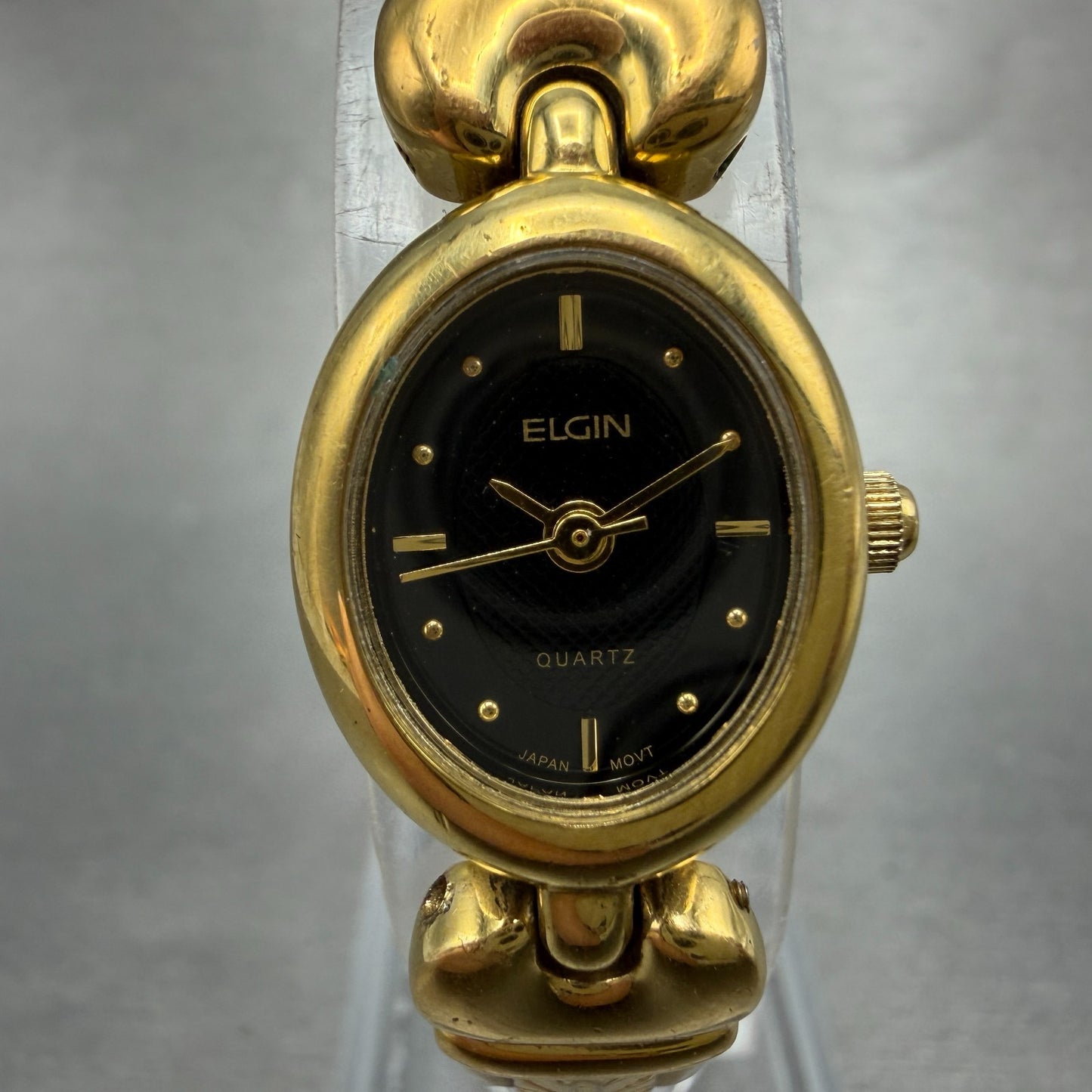 Elgin Watch Women 16mm Black Dial Gold Tone Oval ELB76-017 New Battery0