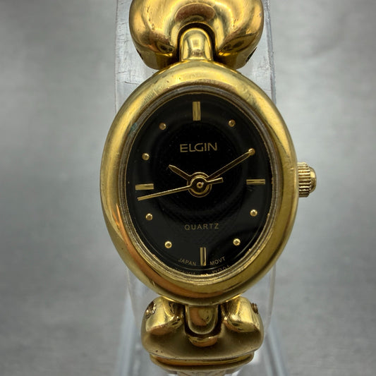 Elgin Watch Women 16mm Black Dial Gold Tone Oval ELB76-017 New Battery0