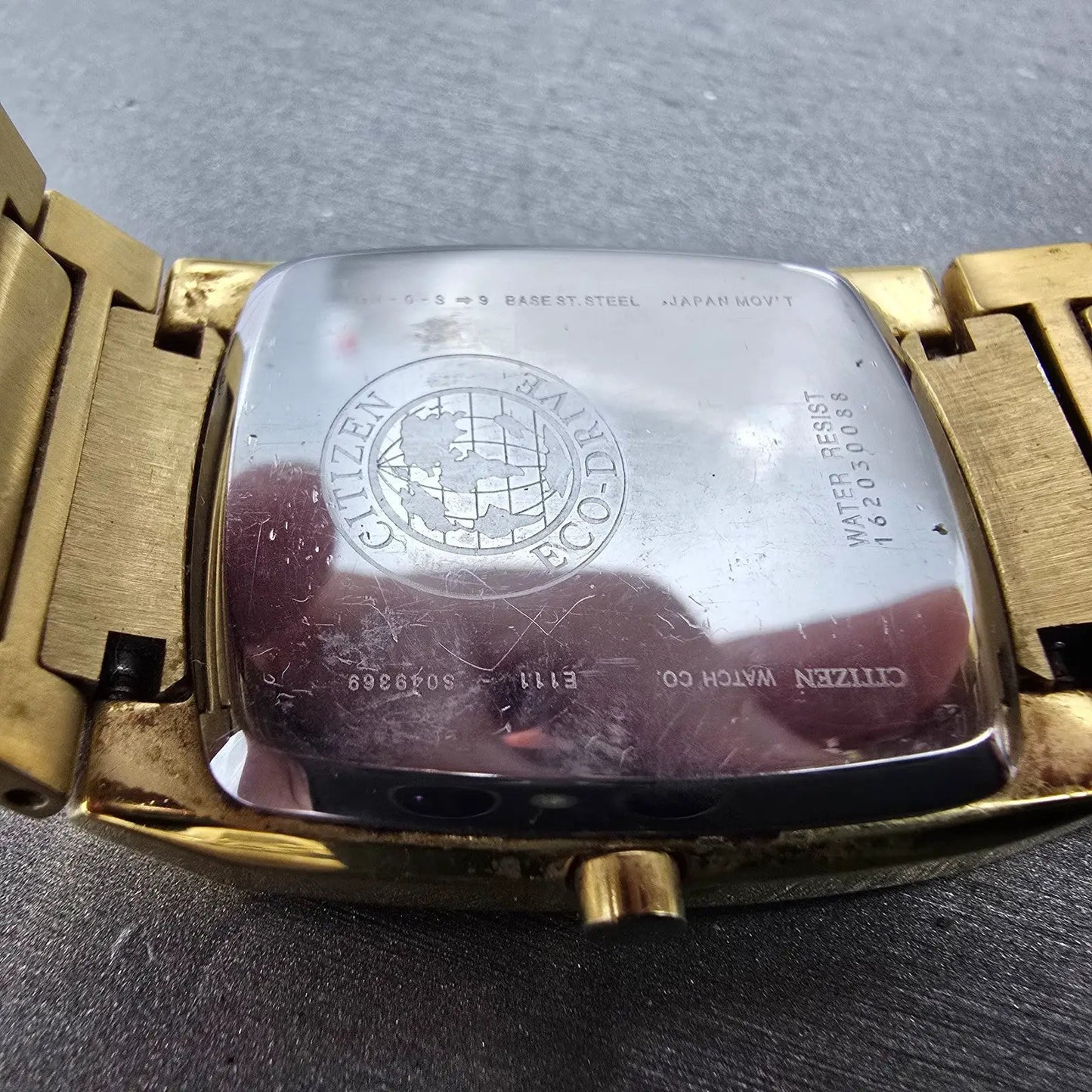 Citizen Eco-Drive Tank Watch Men 31mm Black Dial Gold Date E111-S049369 Runs Jkm11