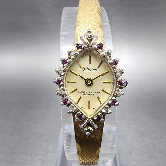 Lucien Piccard Dufonte Watch Women 14mm Champagne Dial Gold Tone Ruby Bezel Runs