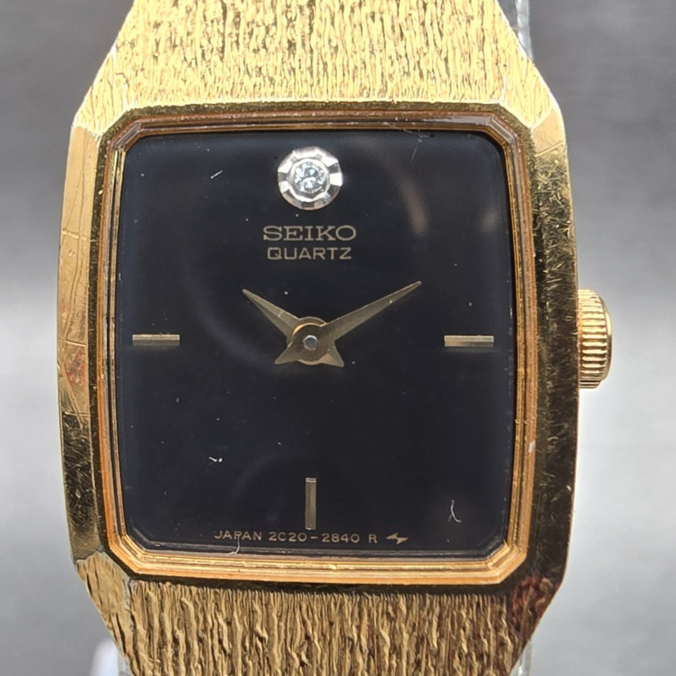 Seiko Womens Watch 17mm Black Dial Gold Tone Rectangle 2C20-6389 New Battery1