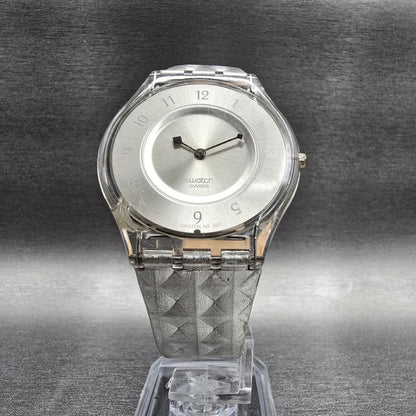 Swatch Skin Facet Glam Watch Women 34mm Silver Dial Clear Case SFK312 New Batt8
