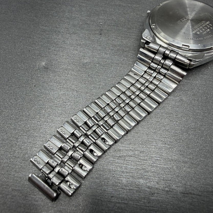 Seiko SQ Watch Men 35mm Silver Dial Silver Tone Daydate 8223-8049 SAMPLE E9