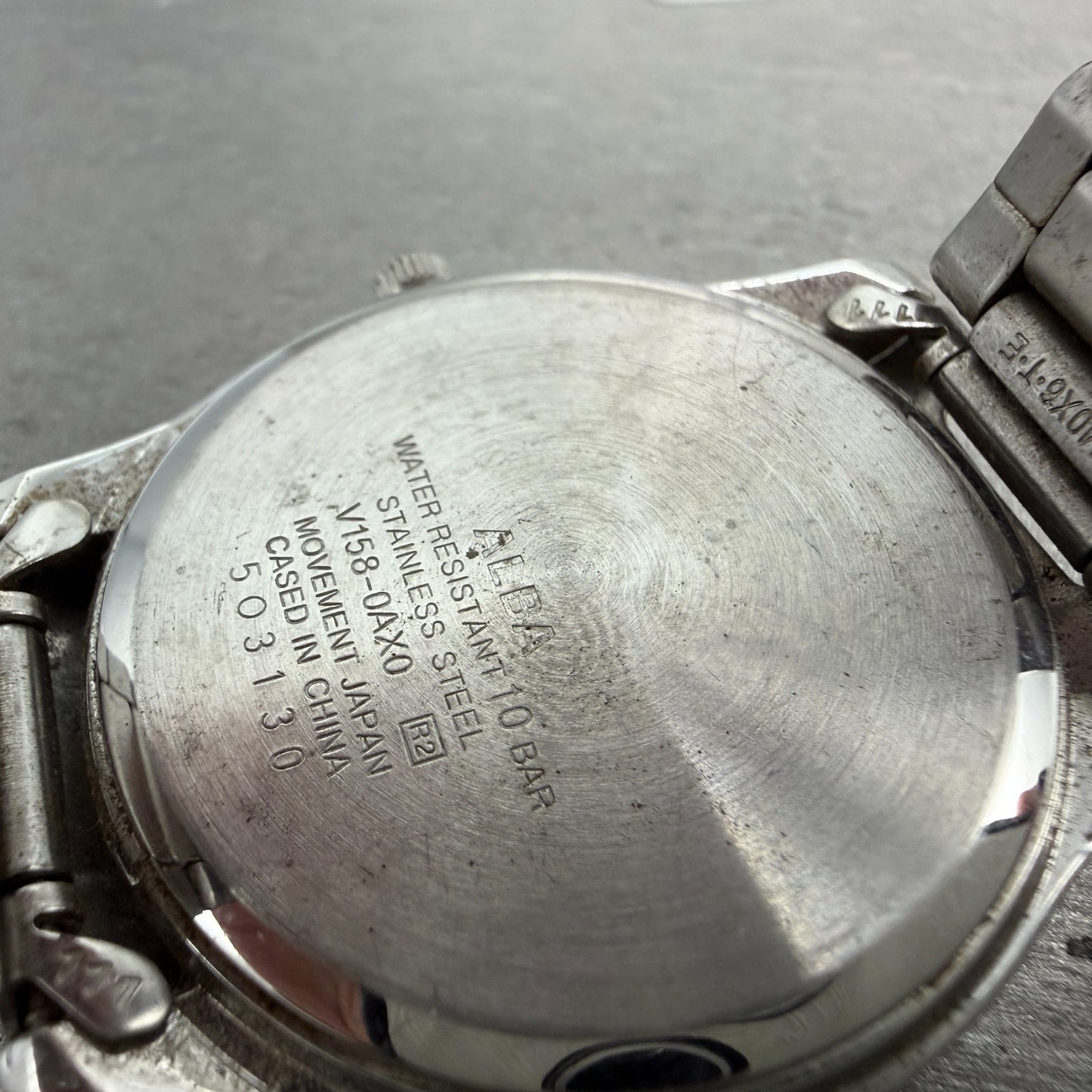Seiko Alba Solar Watch Men 36mm Silver Dial Silver Tone Daydate V158-0AX0 Runs9