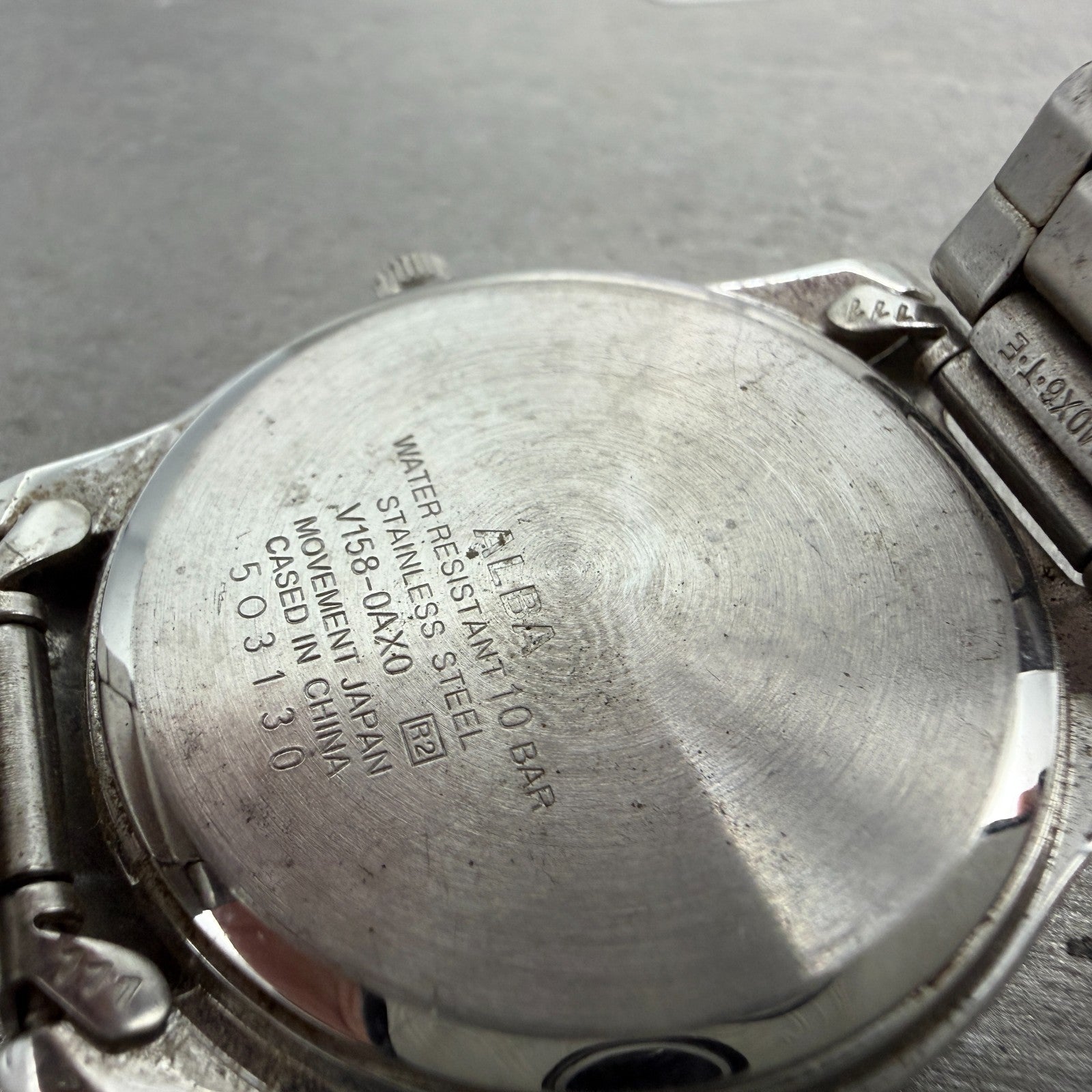 Seiko Alba Solar Watch Men 36mm Silver Dial Silver Tone Daydate V158-0AX0 Runs9