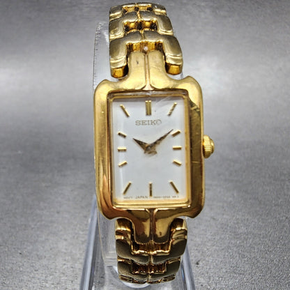 Seiko Tank Watch Women 16mm White Dial Gold Tone Rectangle 1N006T10 New Battery0