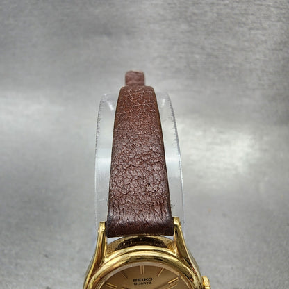 Seiko watch Women 19mm Champagne Dial Gold Tone Round 2p200089 New Battery4