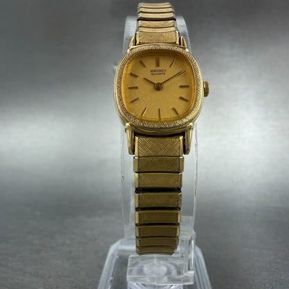 Seiko Watch Women 17mm Champagne Dial Gold Tone Rectangle 2Y00-5028 New Battery65