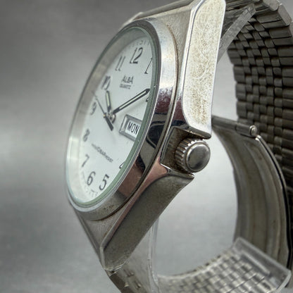 Seiko ALBA Watch Men 35mm Silver Dial Silver Tone Daydate V743-8A10 New Batt M402