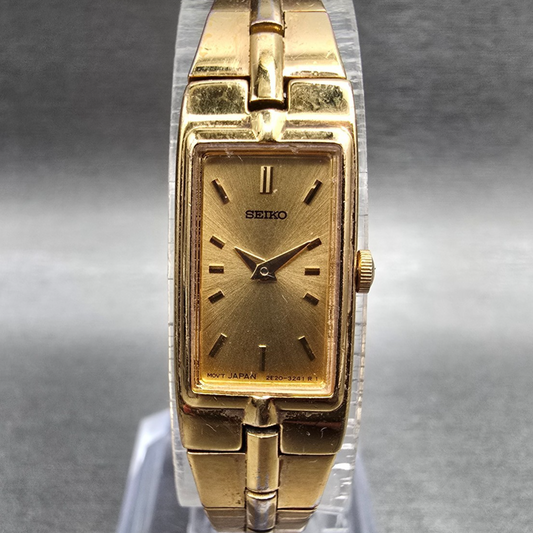 Seiko Tank Watch Women 13mm Gold Dial Gold Rectangle 2E20-7479 New Battery 564560