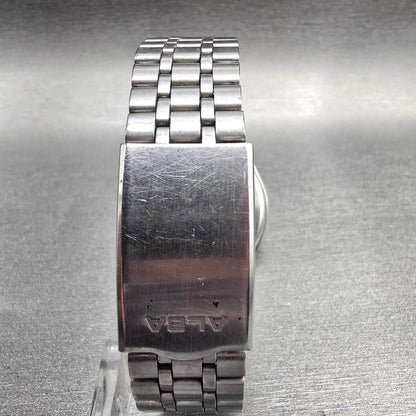 Seiko Alba Watch Men 34mm Yellow Dial Silver Tone Daydate V733-7A00 New Battery7